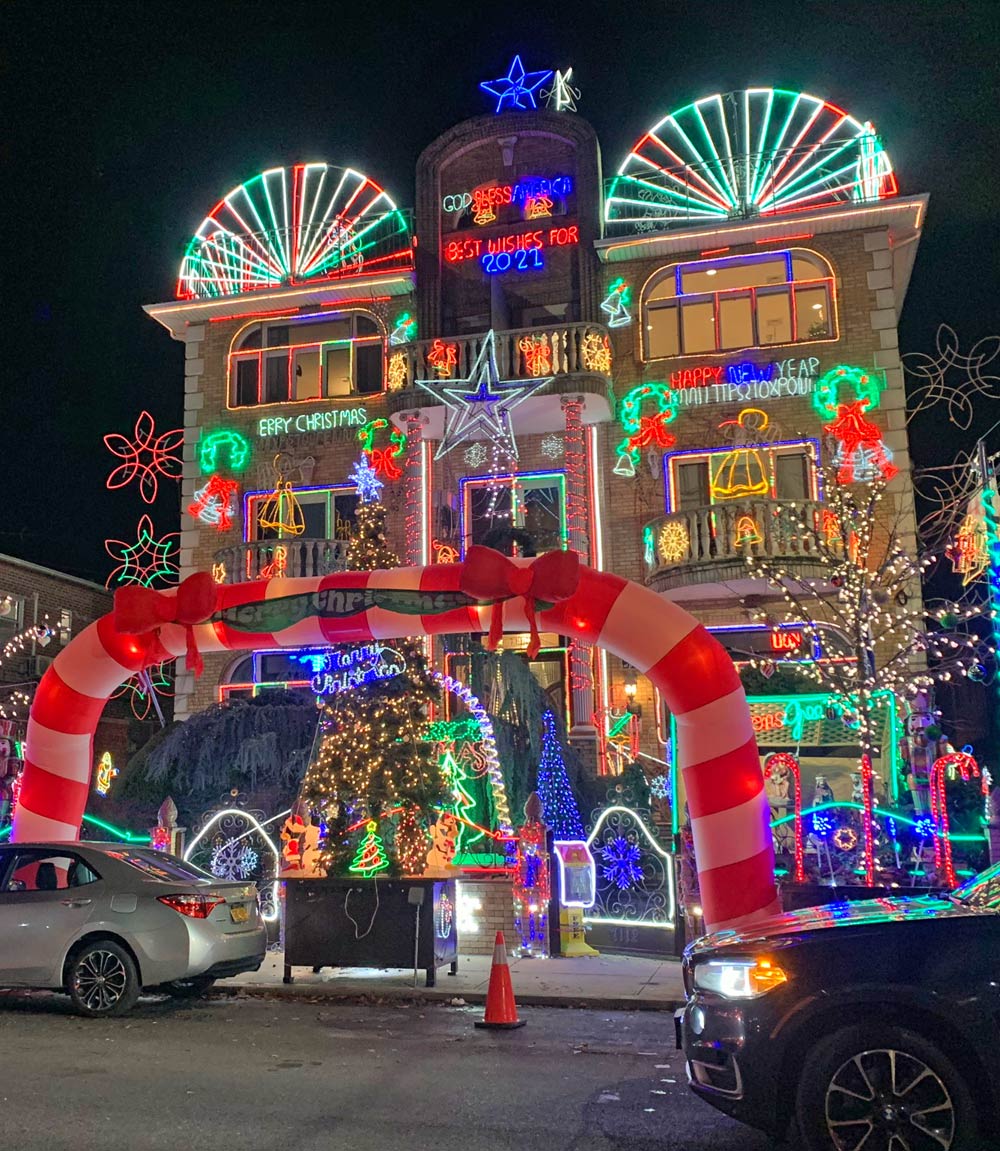 Large house covered in Christmas decorations