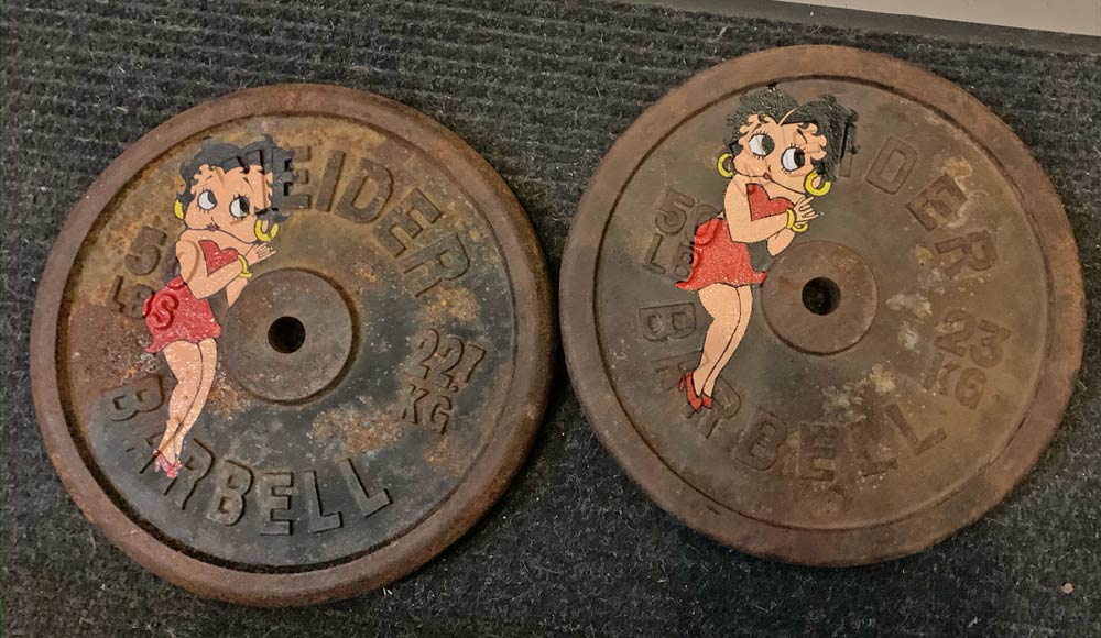Fitness weights with Betty Boop painted on them