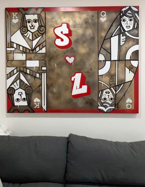 a canvas artwork hanging on a wall