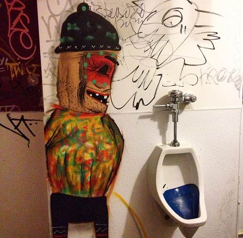 cartoon character urinating in bathroom