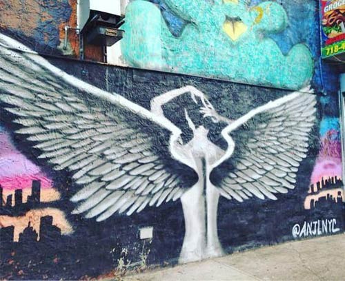 graffiti mural of angel wings