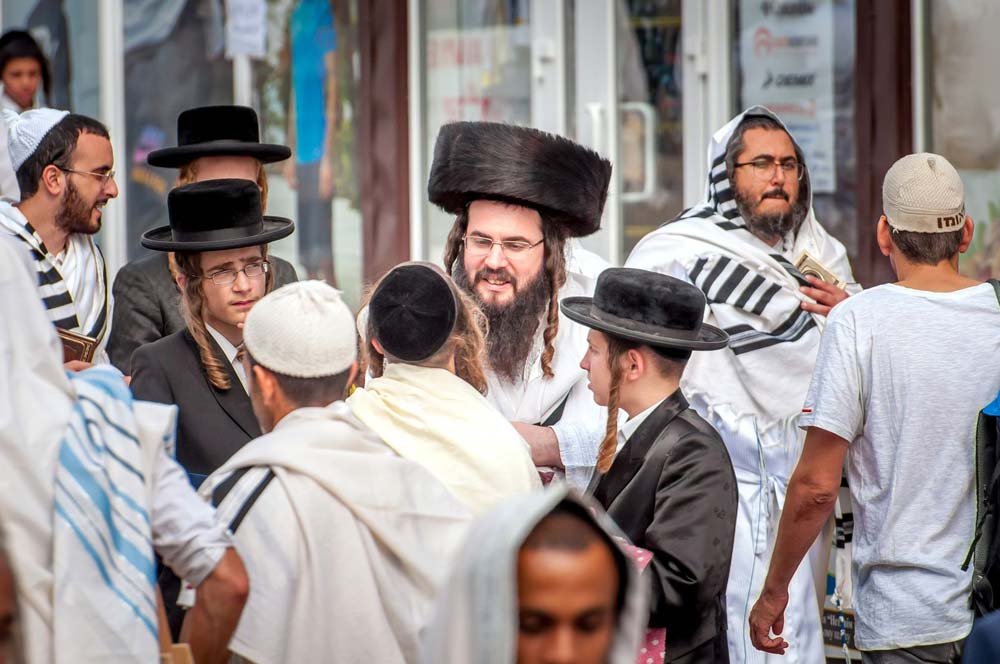 Hassidic men standing together